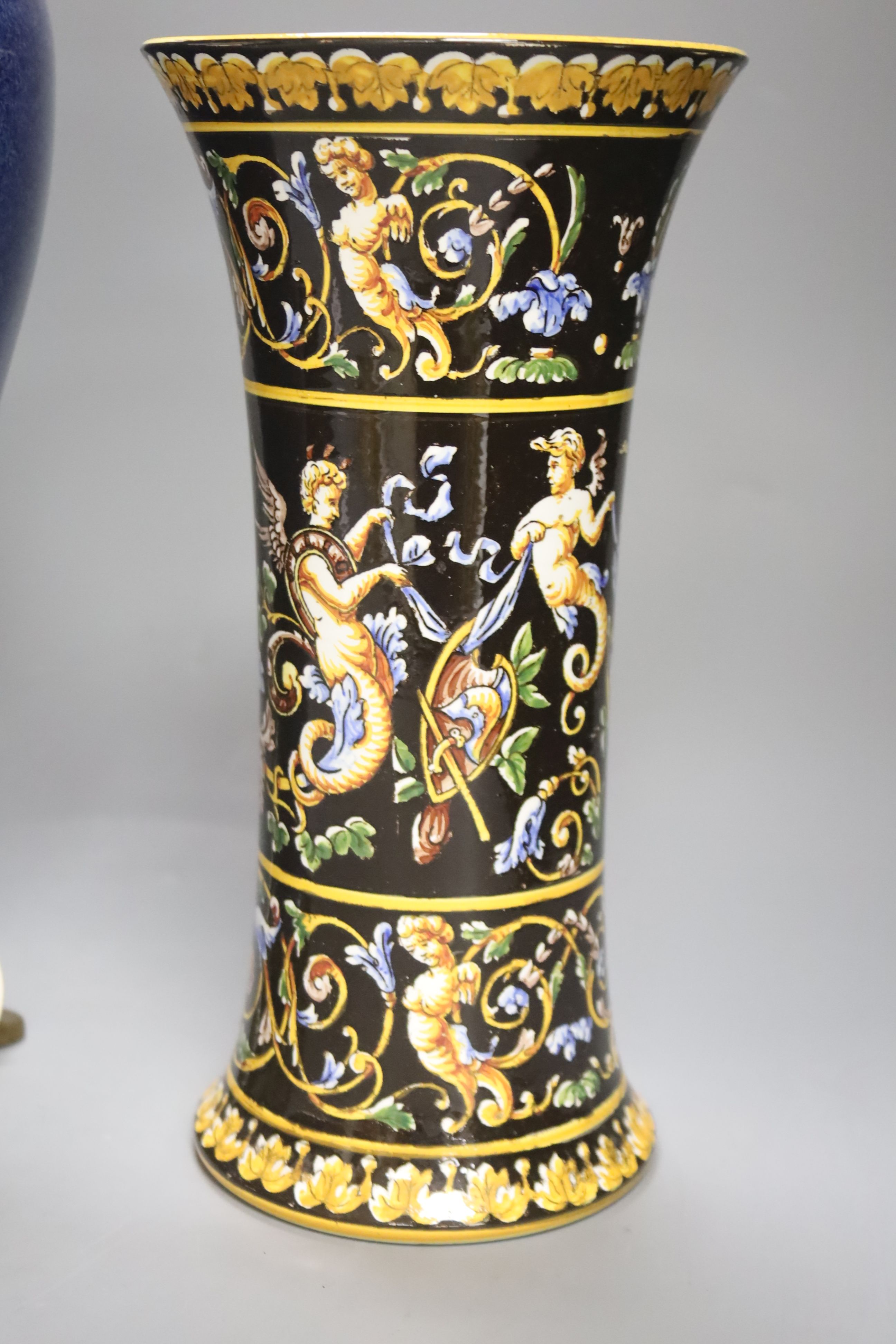 A French powder blue vase with ormolu lamp mounts, height 36cm, and a Gien vase